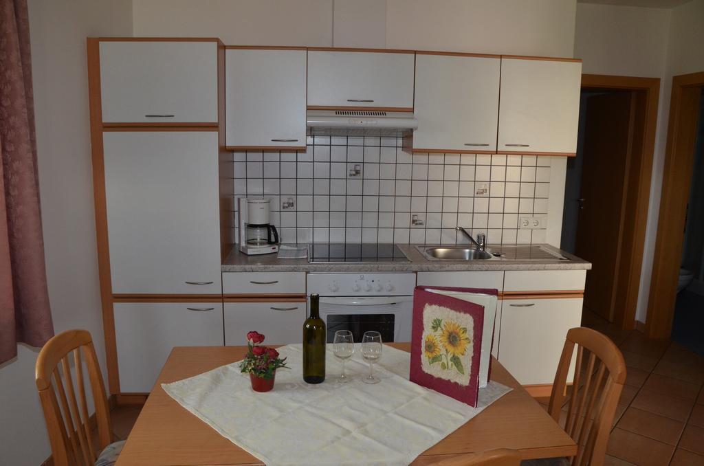 Апартаменти Ansitz Weissenheim Апп'яно-сулла-Страда-дель-Віно Номер фото